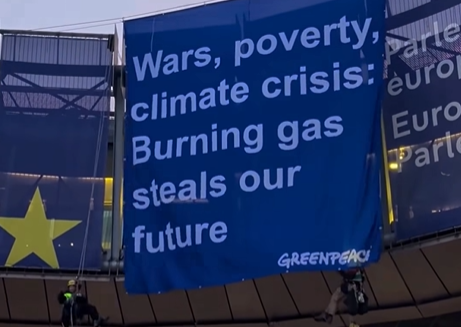 Greenpeace protest at European parliament calls for end to fossil fuels