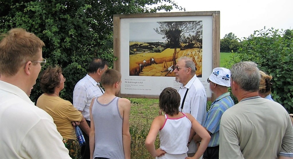 A group gets a tour of the Bruegel open-air museum