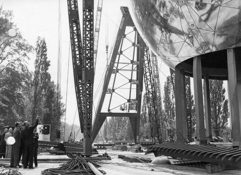 King Leopold observes the construction work on the Atomium