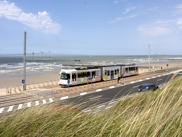 Coastal public transport tram De Lijn at beachside Raversijde