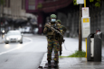 Illustration shows soldiers near the building of DPG media near Antwerp central station which was partly evacuated after they received a threatening letter, in Antwerp Monday 24 May 2021. (BELGA PHOTO KRISTOF VAN ACCOM)