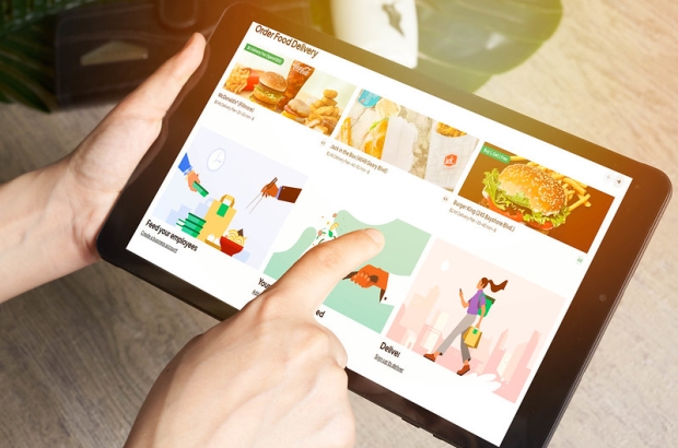 A person orders a meal from a food delivery app (Google images, free licence)