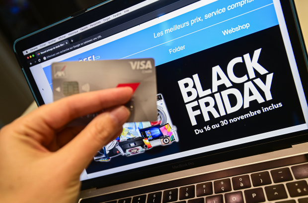 Illustration picture shows a person shopping online on a website in French, searching for discounts for the 'Black Friday' sales event. (BELGA PHOTO LAURIE DIEFFEMBACQ)