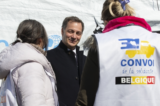 Prime Minister Alexander De Croo pictured during a visit to the UNHCR-UNICEF camp, near the border with Ukraine in Medyka, southern Poland on Tuesday 12 April 2022. The Prime Minister is visiting Slovakia, Poland, Romania and Moldova to discuss the political, military and humanitarian consequences of the Russian invasion. (BELGA PHOTO NICOLAS MAETERLINCK)