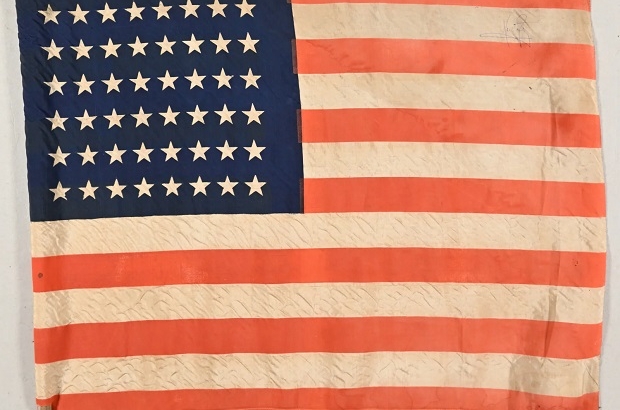 American flag signed by Neil Armstrong