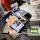 Illustration picture shows payment by smartphone in a Delhaize supermarket in Brussels. (BELGA PHOTO THIERRY ROGE)