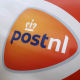 The logo of PostNL pictured on the side of a delivery van. (BELGA PHOTO PHILIPPE FRANCOIS)